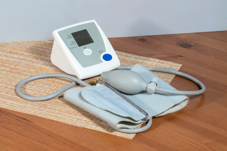 Home household tonometer on a napkin on the table