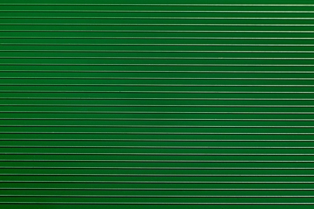 Light green plastic background with bulging strips