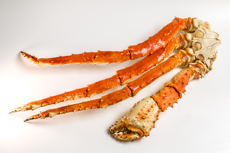 claw of a king crab on a white backgroundの写真素材