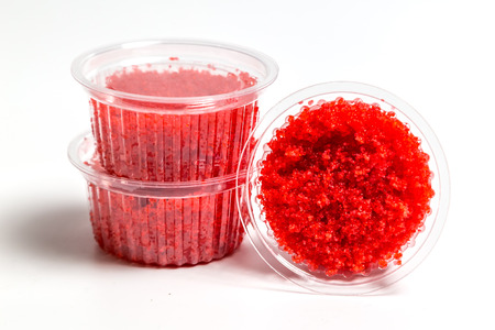 red caviar salmon in a jar on a white backgroundの写真素材