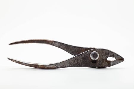 Vintage old repair tool used in work in the country of the USSR, on a white backgroundの写真素材