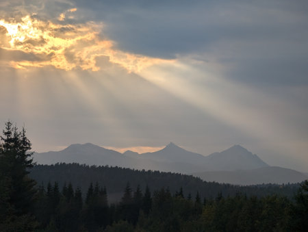 Golden Sunrise Over Mountain Rangeの写真素材