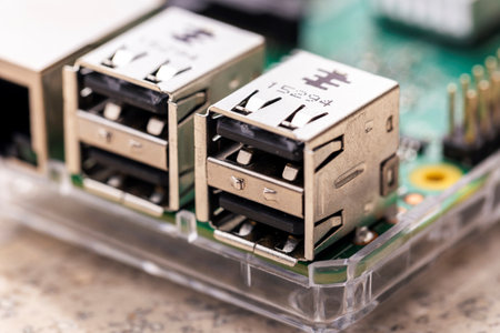 A portrait of four USB A ports on a PCB or circuit board, ready to be used to perform communication with a peripheral device or to transfer data to and from a memory stick.の写真素材