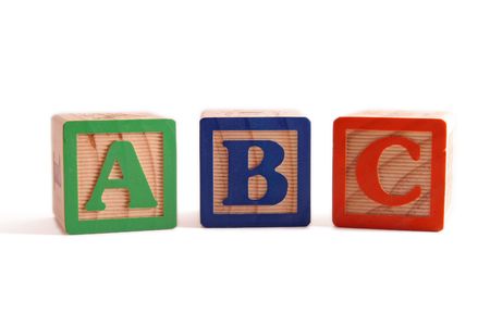 ABC wooden blocked lined up horizontally.