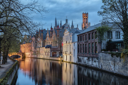 Bridge, canal and old houses in Brugge.の写真素材