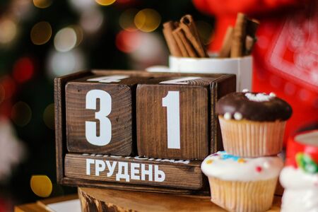 Wooden 31 December calendar. New year at work concept. Winter time.の写真素材