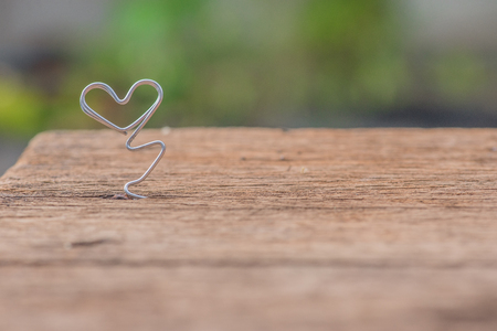 heart on wooden tableの写真素材