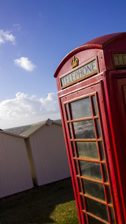 BT GPO red telephone box on a beach, public use call payphone Taken OCT 2014 on exmouth beach,...
