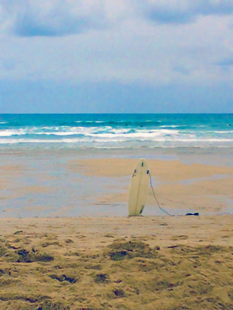 Surf broad on a beach in the south west of the UKの写真素材
