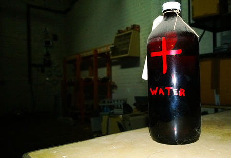 Old first aid bottle with bokehの写真素材