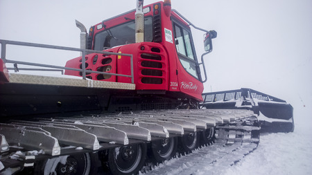 Val Thorens, France -  January  16, 2015: Showing the side of a piste bully at Val Thorens Ski Resort.のeditorial素材