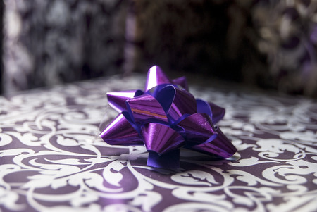 Presents shown on a table with a bow, some close upの写真素材