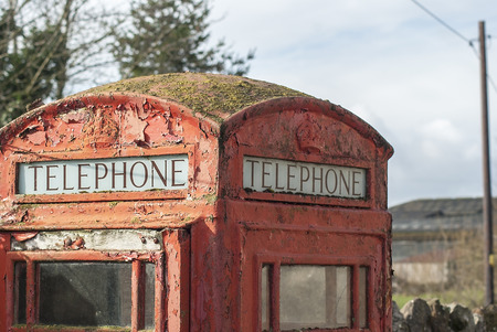 GPO phonebox with some colours removed, on a overcast day