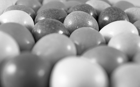 Easter mini eggs shown on a grey slate tile,の写真素材