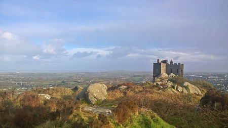Red Redruth, Cornwall, UK -  September 2, 2014: Showing the Carn Brea Castle on top of a hill by Redruthのeditorial素材