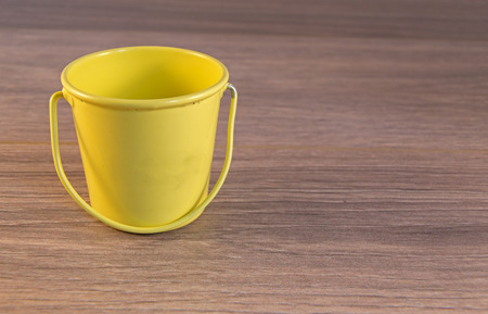 Egg cups shown lying on a wooden の写真素材