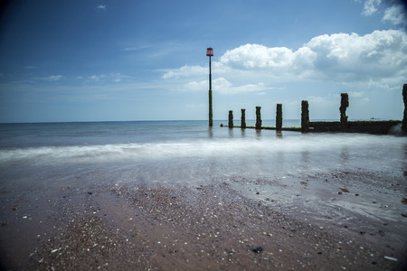 Shot of a beach on a sunny day looking out to the seaの写真素材