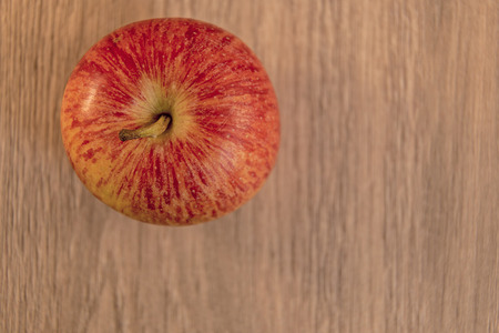 Apple shown on a wooden .の写真素材