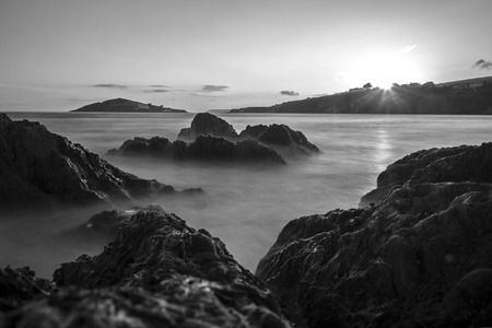 Sunset by a beach in south devon UK