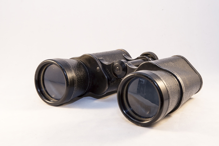 Showing a pair of binoculars on a white backgroundの写真素材