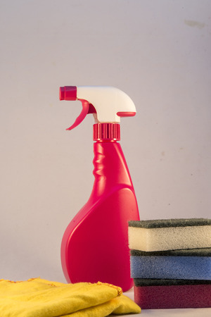 Bottle, sponge and lemonの写真素材