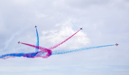 Torquay, Devon, UK, 12 June 2016 Showing the various formations of the RAF Red Arrows air display at the Torquay airshow, shot from public land during an overcast dayのeditorial素材