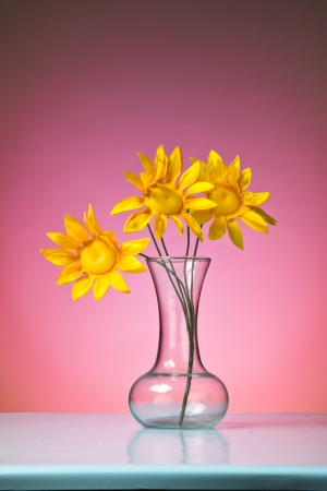 A bouquet of flowers against a colorful background の写真素材