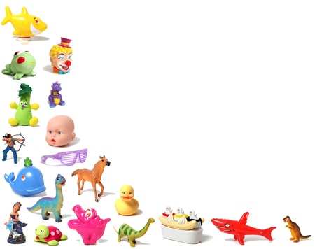 A collection of toys in a border shape against a white background の写真素材