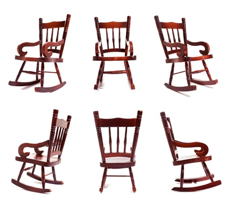 A collection of a wooden rocking chair against a white background の写真素材