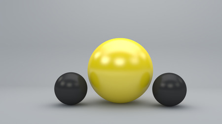 3d grey spheres with big yellow one standing outの写真素材