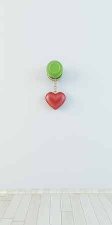 3d red shape heart hanging with chain on knobの写真素材