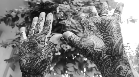hands up with mehandi on both handsの写真素材