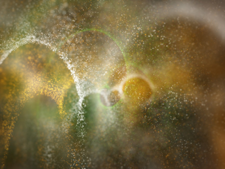 three colors orange, white and green particles for web or wallpaper backgroundの写真素材