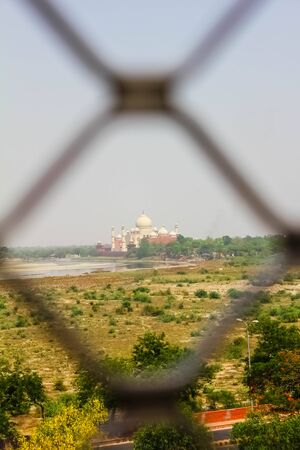 Taj Mahal, Agra, India. Picture taken in fort from a far distance through jali, Uttar Pradeshの写真素材