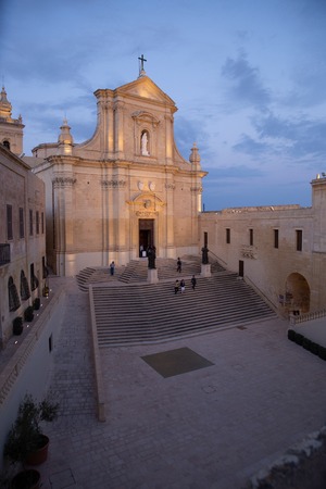 People leaving the cathedral in the Citadel in Gozo just after mass has finishedのeditorial素材