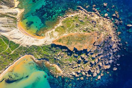 Golden Sands and Turquoise Waters A Drone's Perspective of Ghajn Tuffieha and Maltas-Dramatic Coastlineの写真素材