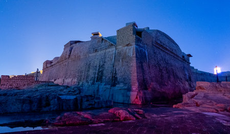 Fort St. Elmo in Valletta Malta is lit at night