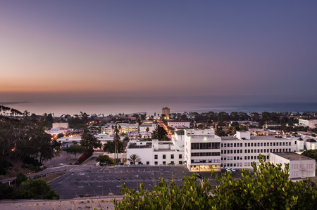 Night lights of Ventura glow under the predawn sky.