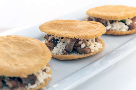 Three Gorditas served with on a long plate looks and tastes appealing.の写真素材