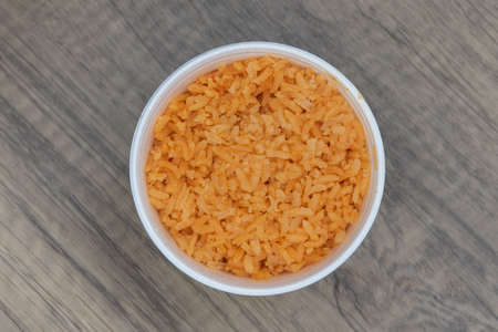 Overhead view of large container of fresh homemade green salsa ready to serve as a dip.の写真素材