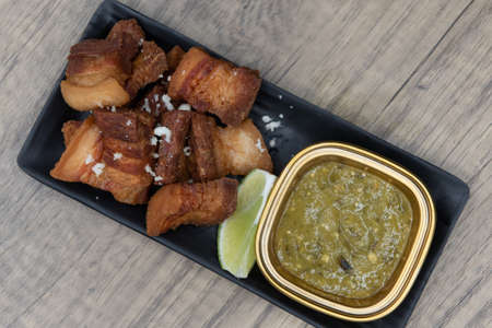Overhead view of tasty appetizer of cripsy chichurron to eat before your meal.