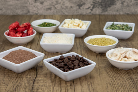 Variety of nutritious freeze dried supplements to add to any smoothie for a health boost.