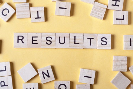 RESULTS word written on wood block. Wooden abc.の写真素材