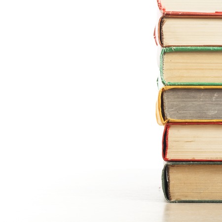 Stack of books isolated on white background.