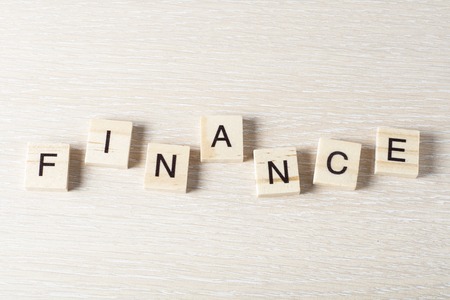 Wooden Blocks with the text: Finance. Wood ABCの写真素材