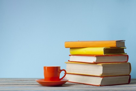 Stack of books on wooden table.Education background. Back to school.Copy space for text.の写真素材
