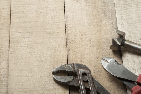 Set of assorted work tools on wood texture background.Copy space for text. Construction conceptの写真素材