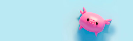 Pink piggy bank on blue background with copy space. 3d renderingの素材