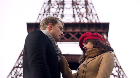 Careless girl leaving man in love, end of romantic relationship, breakupの写真素材