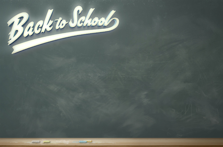 A chalkboard with lighted lettering: Back to Schoolの写真素材